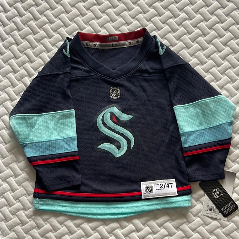NLA GIFTED 5 11 26 NHL Blue Jersey with Striking Teal Details
